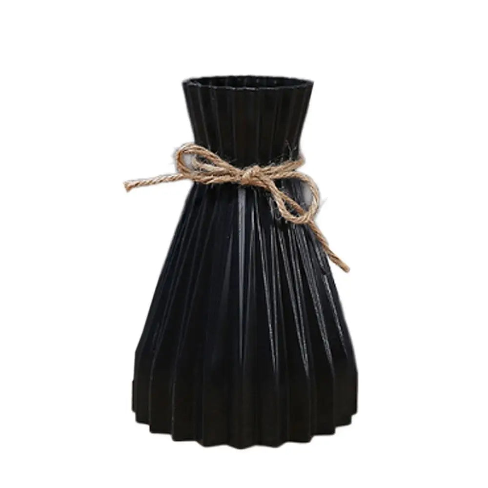 Black pleated ceramic flower bottle with rustic twine bow designed as a modern dry flower bottle type