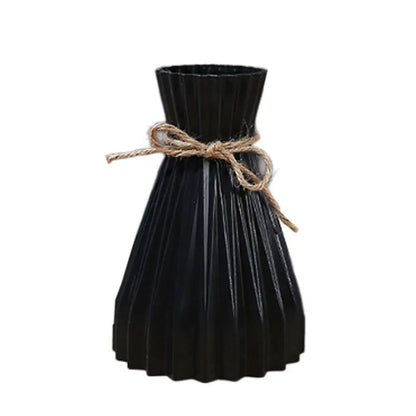 Black pleated ceramic flower bottle with rustic twine bow designed as a modern dry flower bottle type