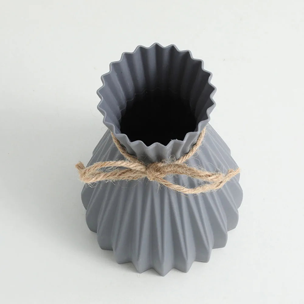 Gray ceramic flower bottle with fluted scalloped rim and natural twine tied waist dry flower bottle type