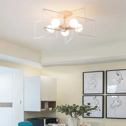Modern geometric ceiling chandelier with five frosted glass bulbs in brushed gold minimalist metal frame decorbites creative star led