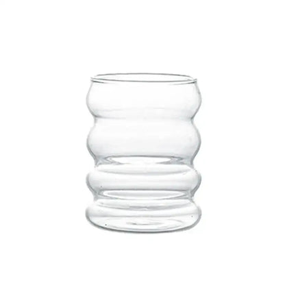 Clear glass tumbler with wavy segmented design for dining room by decorbites creative styling glass drinkware