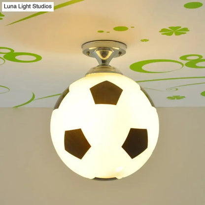 DecorBites fun football flushmount ceiling light with white and black design and metallic base for kid’s room