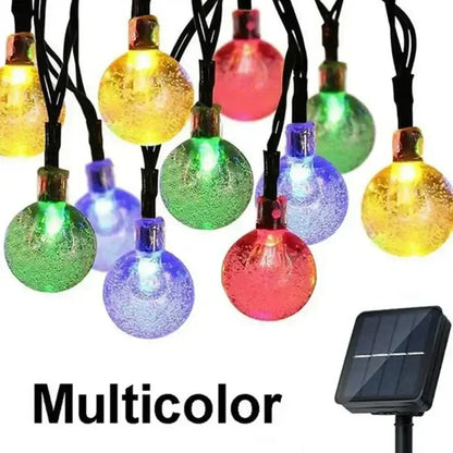 Multicolor ice globe fairy solar string lights with frosted glass bulbs and solar-powered base for warm yellow decorbites crystal fairy patio decor