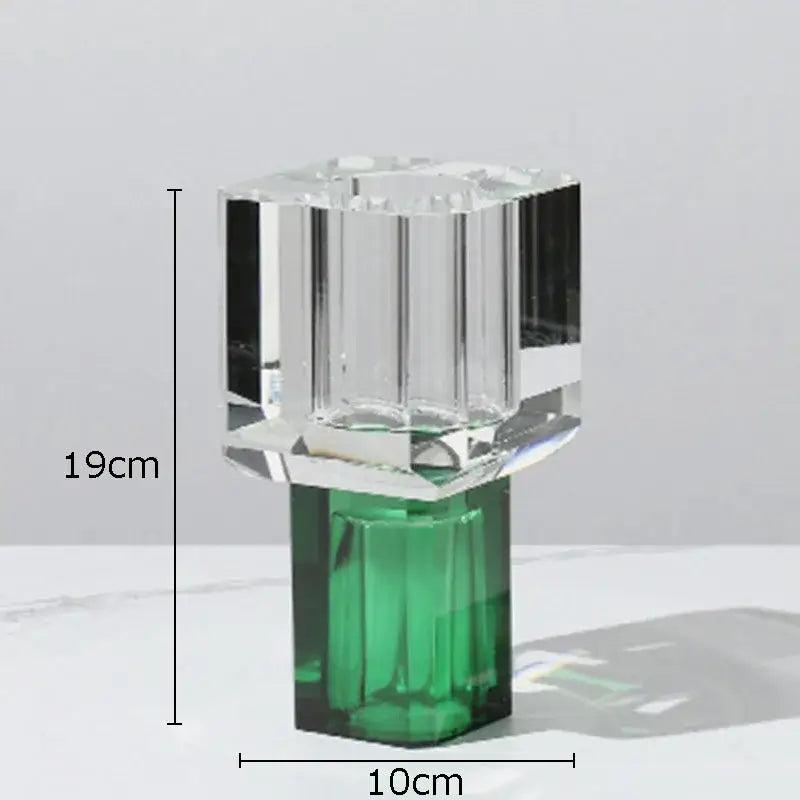 Crystal clear glass vase with faceted design and vibrant green base ideal for living room decor