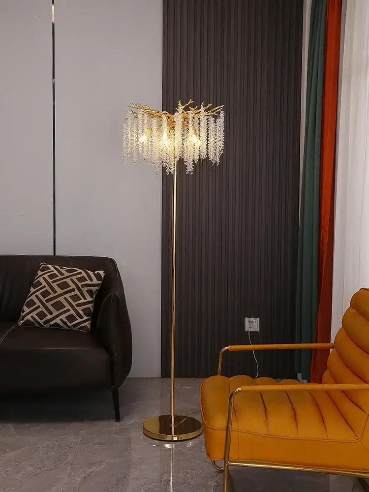 Gold-toned floor lamp with branching design and dangling crystal beads for living room decorbites crystal gold led lighting