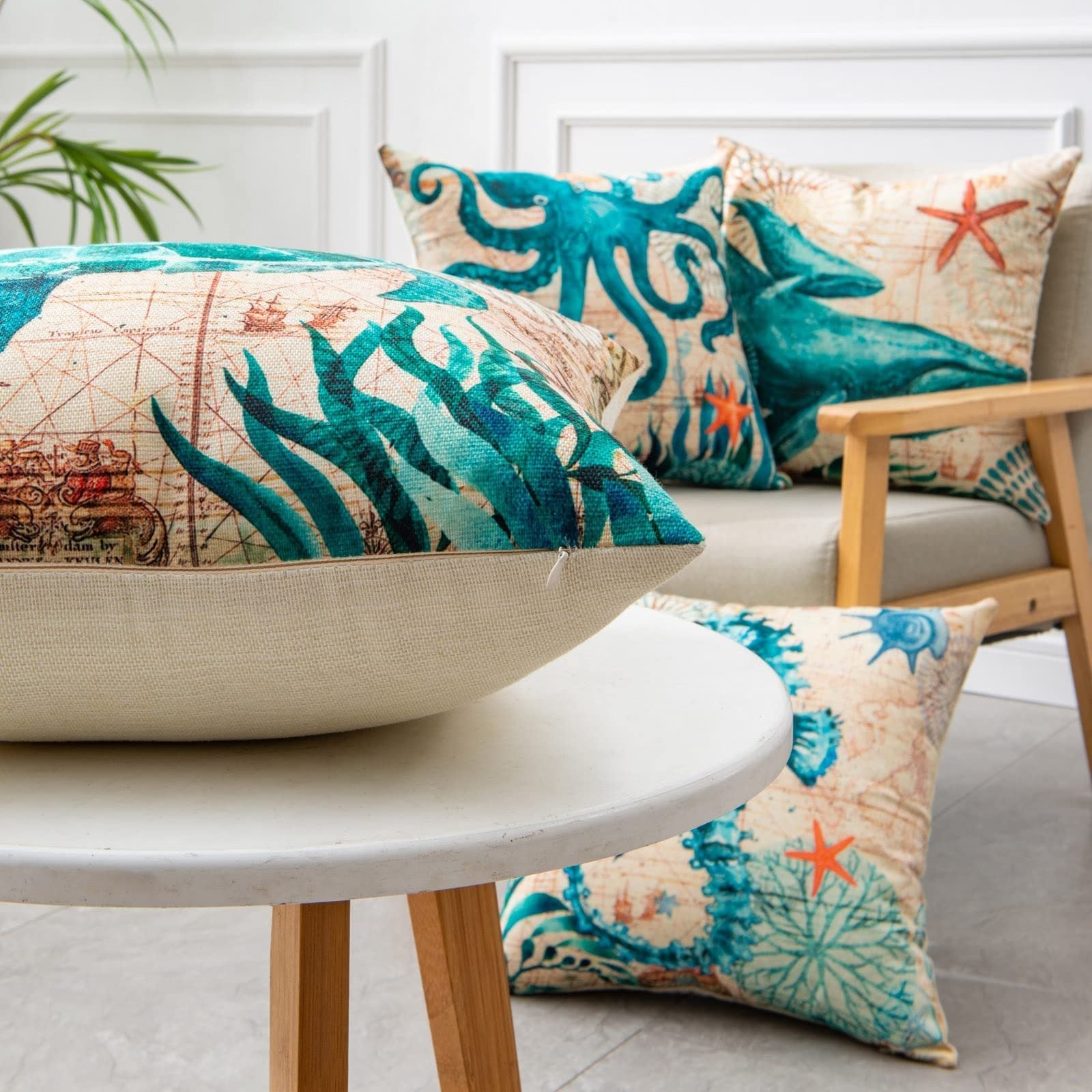 Cream-colored cushion cover with blue and green ocean-themed starfish and coral designs featuring high-definition digital printing for home decor