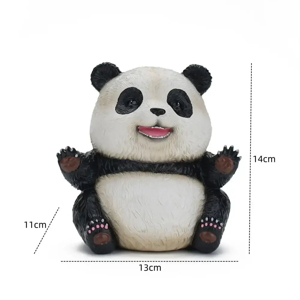 Cute black and white panda baby figurine with pink paws sitting in a cheerful pose for living room decor