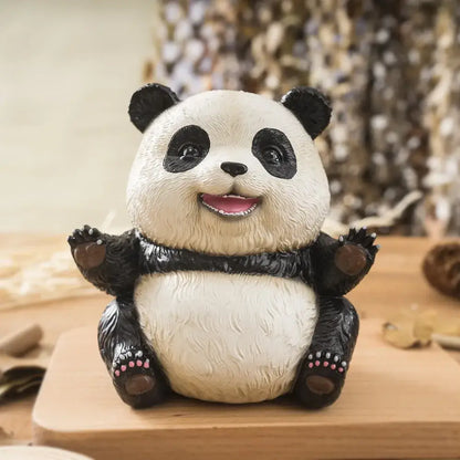 Adorable black and white panda baby figurine with textured fur and pink paw pads for living room decor