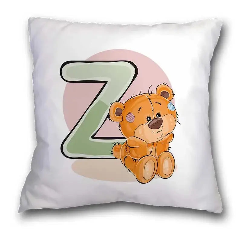 White throw pillow case with cute cartoon bear animal and large green letter z for bedroom decor