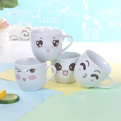 Set of four white ceramic cartoon coffee mugs with expressive faces blush cheeks decorbites cartoon coffee mug set