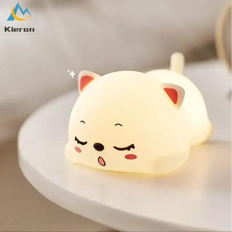 Cute cream cat silicone led night light with red inner ear details and closed eyes for bedroom decorbites cat silicone decor