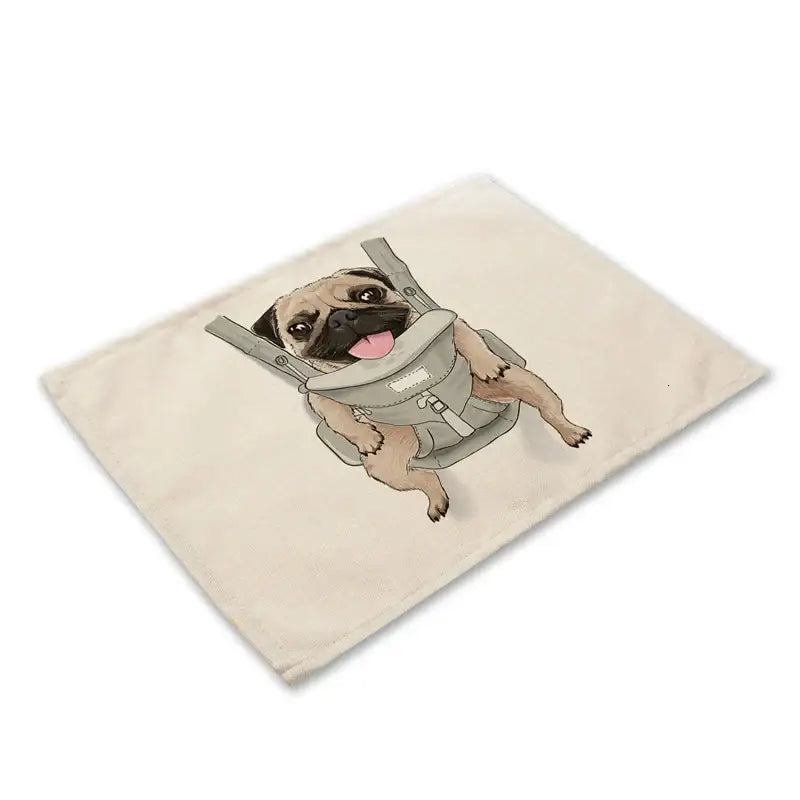 Beige canvas placemat featuring a cartoon pug in a gray baby carrier from decorbites cute dog linen dining mats set