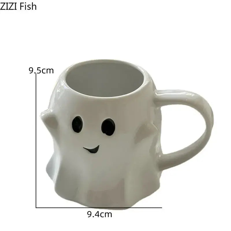 White ceramic mug shaped like a smiling ghost with black eyes from decorbites cute ghost mug set for kitchen use