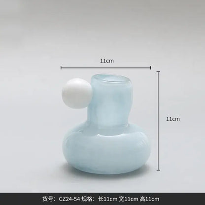 Cute glass ball light blue translucent glass vase with white spherical accent used as a decorbites cute glass candle holder
