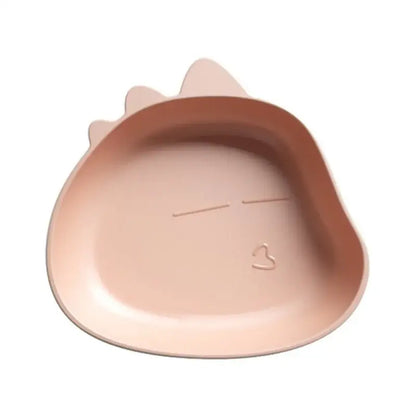 A soft pink cat-shaped dish with molded ears and a simple face design for the cute green bear shape fruit plate set