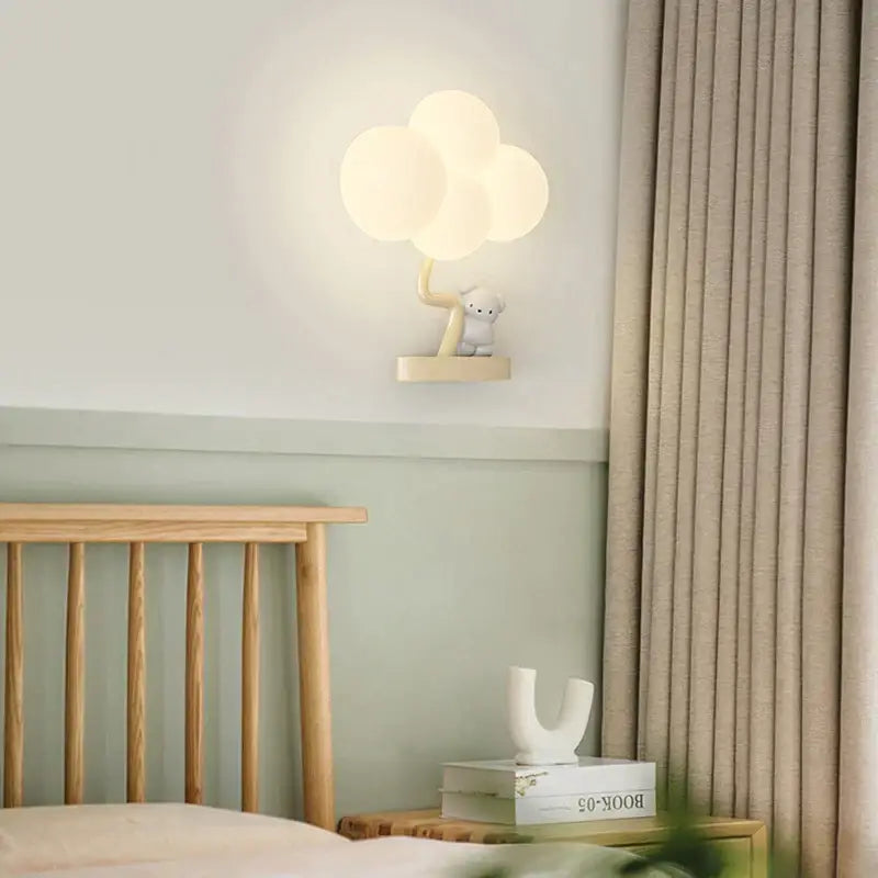 Cute monkey tree wall lamp with cloud shape soft white glow and beige figurine base decorbites cloud shape lighting