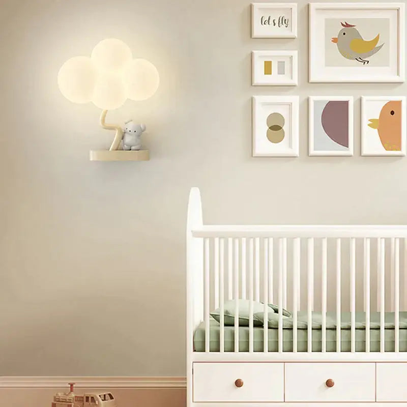 Cute monkey tree wall lamp with warm cloud shape light and small elephant figurine base for cozy decorbites wall lamp