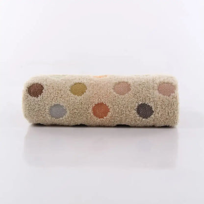 A soft beige cotton dot face towel with multicolored polka dots from the cute pink and beige face towel set by decorbites