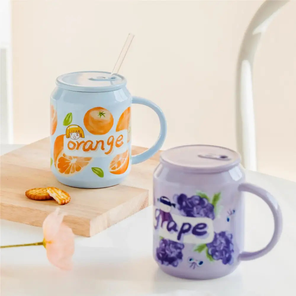 Light blue fruit shape ceramic mug with orange design cartoon girl illustration and matching lid from decorbites