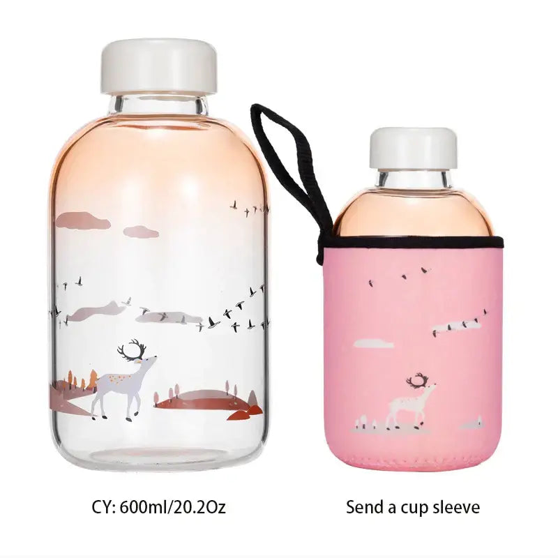 Clear glass water bottle with pink deer and landscape illustration and white cap by decorbites blue glass water