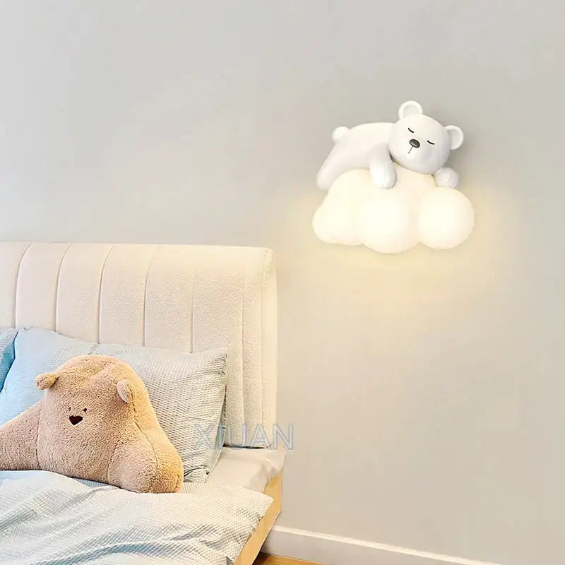Cute polar bear cloud wall lamp in white shaped like a polar bear resting on a cloud base for kids bedroom decor