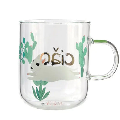 Clear glass coffee mug with white bunny illustration, green cacti, and gold foil cão lettering for tea or coffee use
