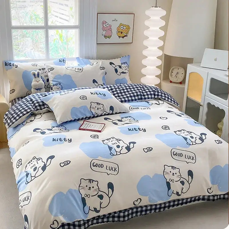 Cute printed cotton duvet cover in cream and navy featuring blue and white cat-themed decorbites cute printed design