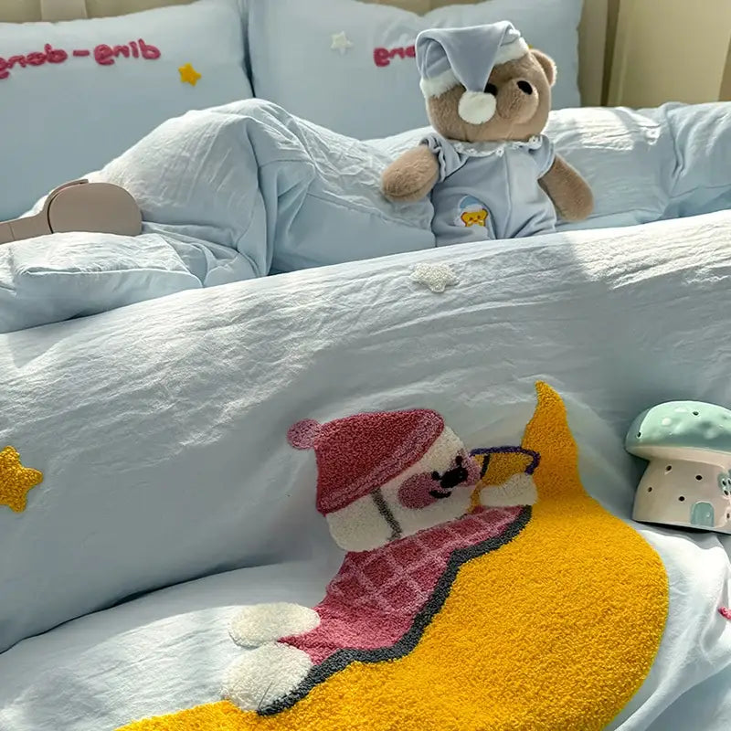 A soft brown plush teddy bear in light blue pajama set with decorbites cartoon embroidery bed set bedroom soft blue bedding
