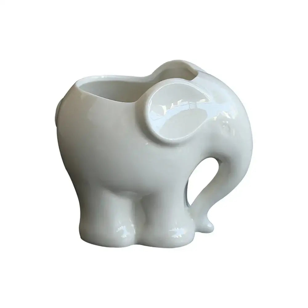 White ceramic elephant succulent planter with glossy finish and open mouth design for bedroom decor
