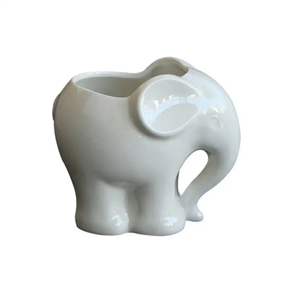 White ceramic elephant succulent planter with glossy finish and open mouth design for bedroom decor