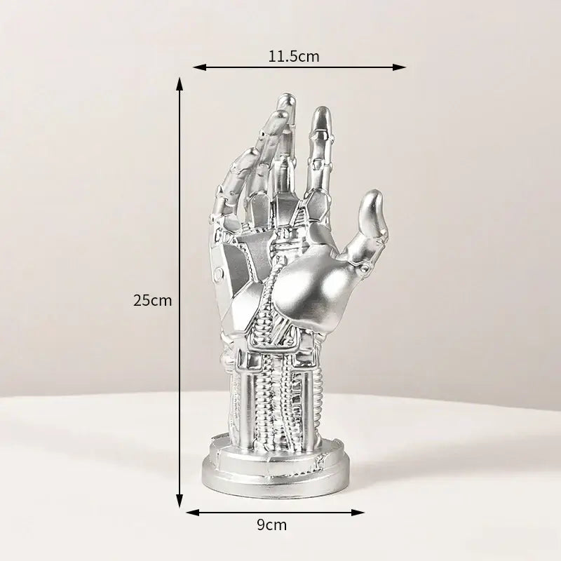 Silver metallic mechanical arm sculpture with intricate details on cylindrical base desktop stand decorbites cyberpunk decor