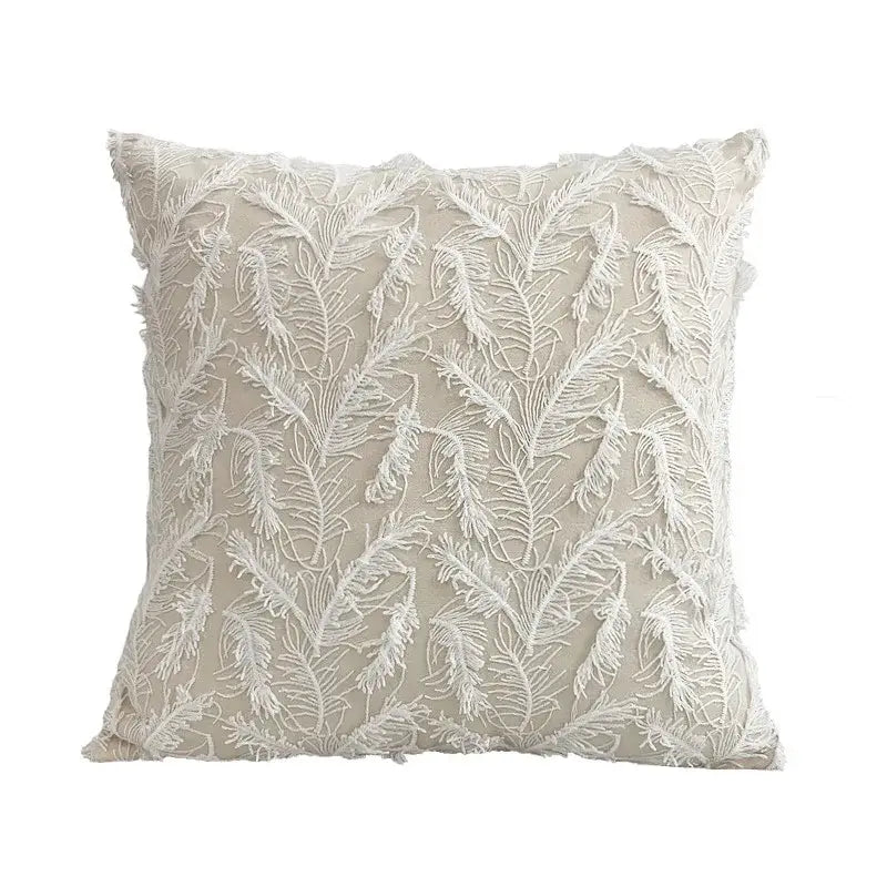 Beige cushion cover with intricate white feather embroidery and frayed edges decorbites daisy flora decorbites daisy flora embroidered blue and white cushion cover living room decor