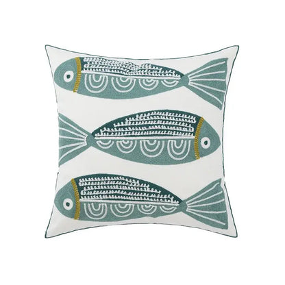 White cushion pillow cover with three embroidered teal fish detailing for decorbites daisy home floral decor
