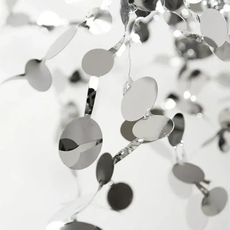 Silver metallic oval sequins strung on wire in dandelion gold and silver decorbites chrome leaf led chandelier dining room light