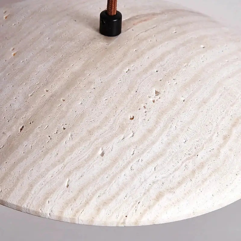 Danish cream stone wood chandelier with round off-white pendant light featuring textured surface and natural veining