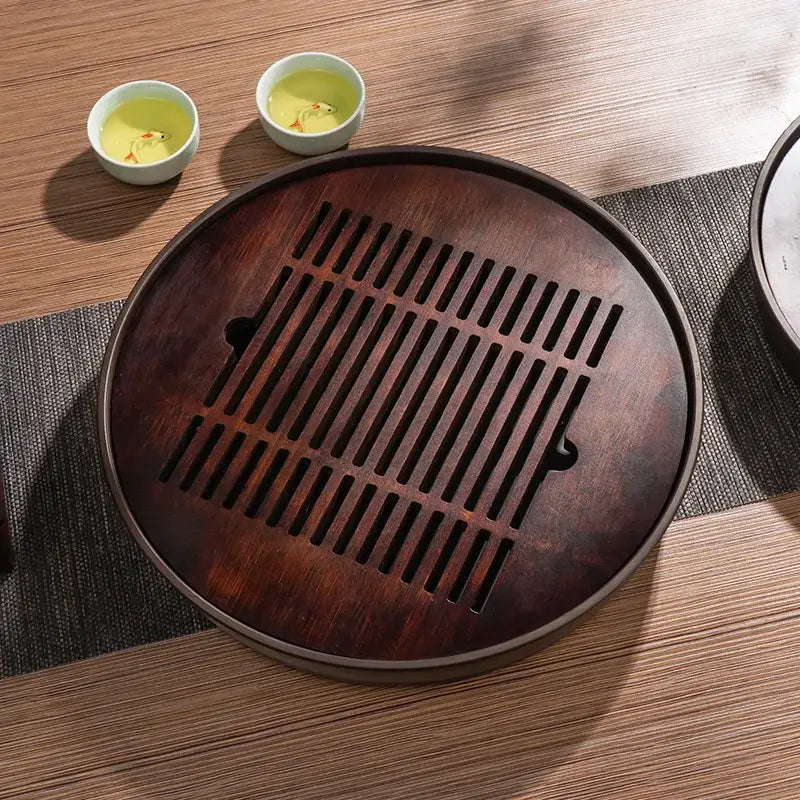 Dark brown bamboo tea tray with parallel slats for drainage designed for kung fu tea and dining room use