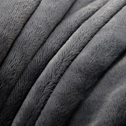 Dark gray plush fleece fabric with soft ribbed folds in decorbites cozy flannel blanket for living room sofa cover