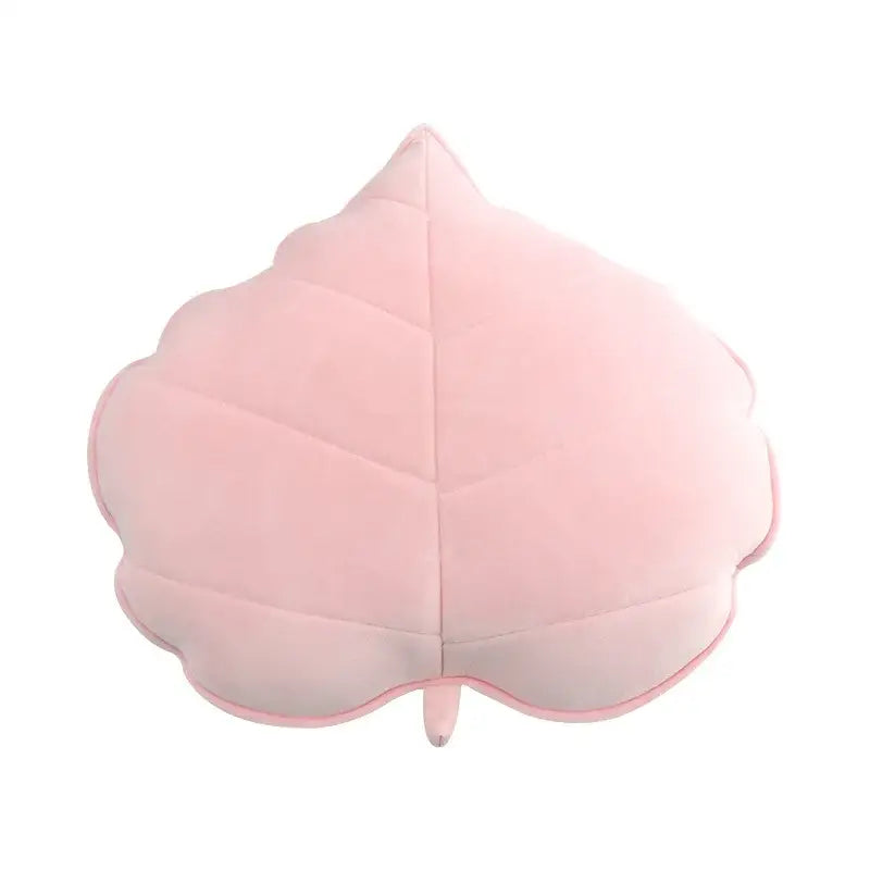 A soft pink plush decorbites 3d leaf throw pillow with stitched veins and stem for bedroom decorbites 3d leaf throw