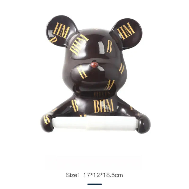 Black glossy bear-shaped resin paper towel holder with gold hm lettering and red gemstone nose for bathroom wall decor