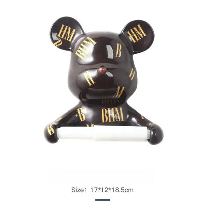 Black glossy bear-shaped resin paper towel holder with gold hm lettering and red gemstone nose for bathroom wall decor