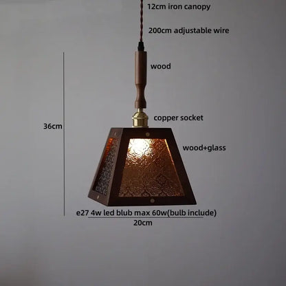 A warm-toned dark wood and amber glass led pendant lamp for dining room with pyramid-shaped design