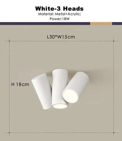 Modern white square dimmable ceiling spot light with three cylindrical heads made of metal and acrylic for living room