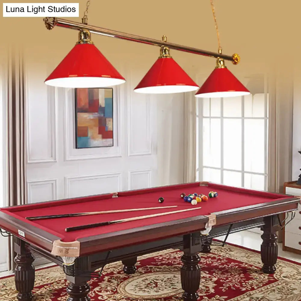 DecorBites 3-head conical metallic billiard lighting fixture in black and red above red felt pool table with dark wood frame