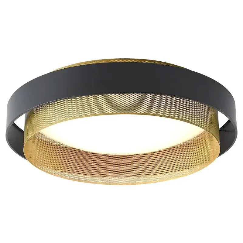 Modern black and gold led ceiling lamp with perforated rings emitting soft white illumination for home office use