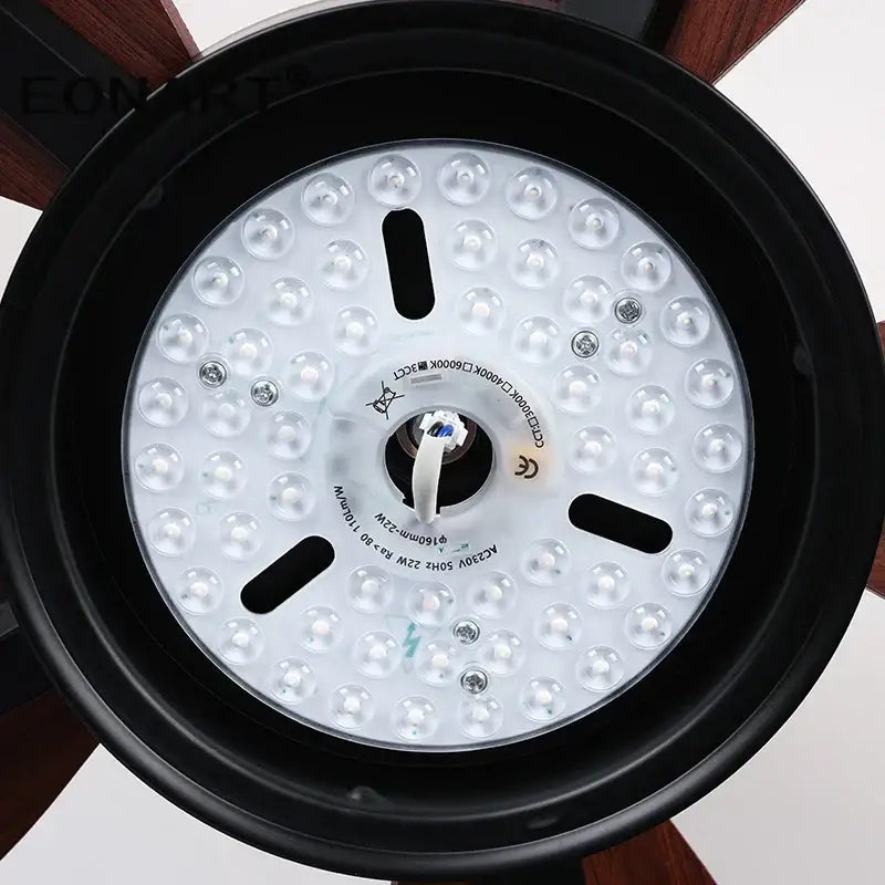 Modern black led ceiling fan with remote control featuring circular light fixture with clear dome-shaped bulbs for bedroom