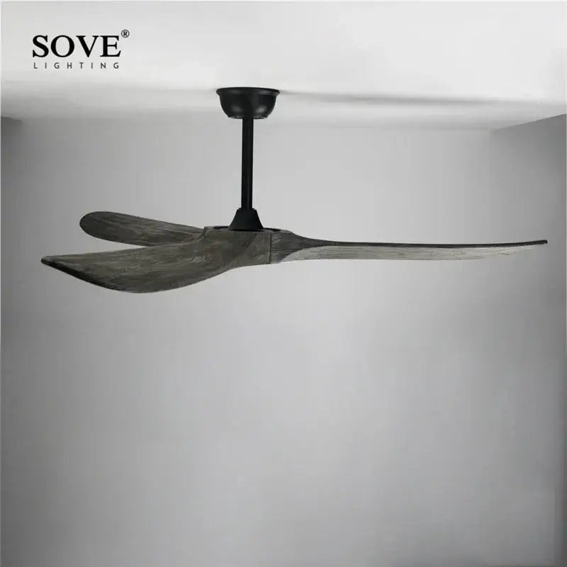 Vintage grey wood ceiling fan by sove lighting with sleek black motor and weathered wood blades for living room use