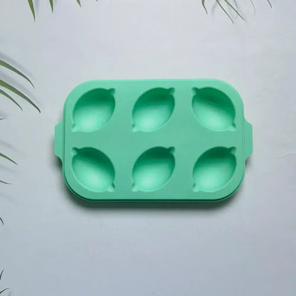 Decorbites™ mint green lemon shape silicone cake mold with six cavities and rounded handles for diy baking