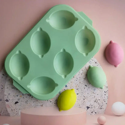 Mint green lemon shape silicone cake mold tray with 6 cavities for diy baking and decorating by decorbites