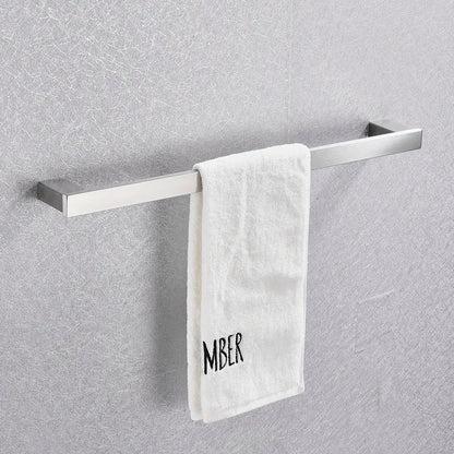A sleek brushed nickel towel rack from the decorbites 6-piece bathroom accessories set with a white terry cloth towel