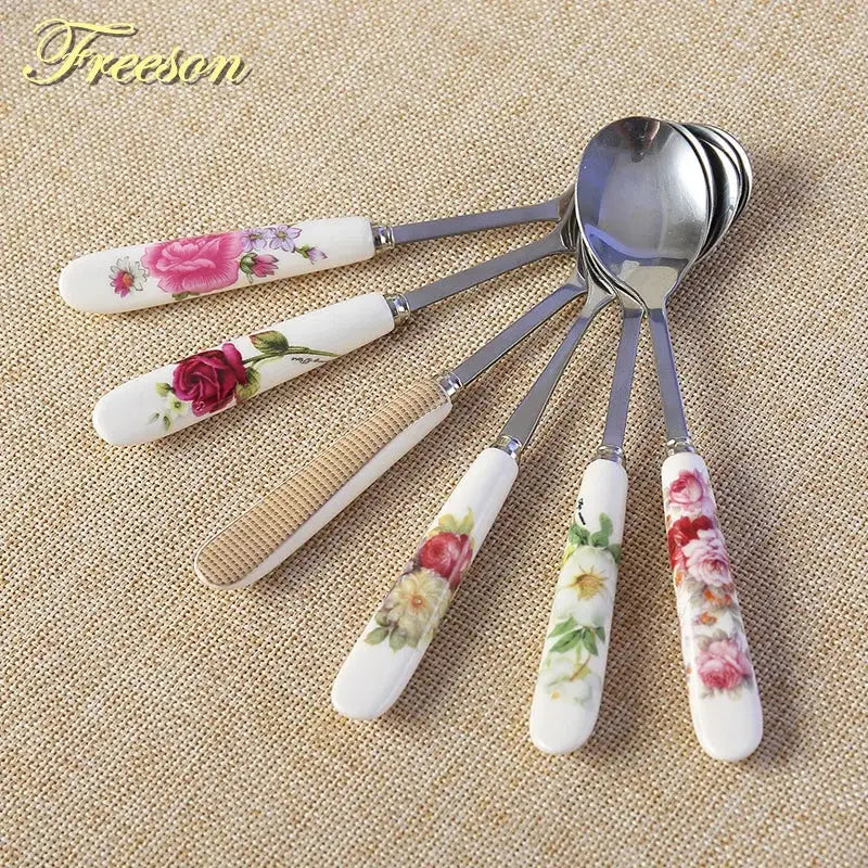 Set of five decorbites™ coffee spoons with floral ceramic handles and stainless steel bowls in european bone china